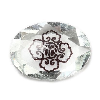 Señaló hacia cabujones de diamantes de imitación de cristal, ovalado con estampado de insectos o flores
