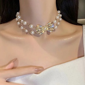 Double-layer pearl butterfly bow necklace - trendy collarbone chain choker, unique.