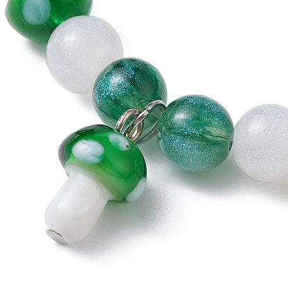 Bracelet extensible perlé au chalumeau avec charmes de champignons en résine