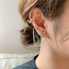 Boucles d'oreilles papillon en zircon étincelant avec bijou d'oreille intégré et clip incrustés de diamants.