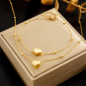 Минималистичный комплект подвесок в форме сердца для женщин — универсальное сочетание ожерелья и браслета из титановой стали