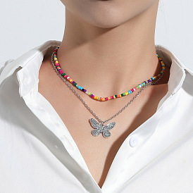 Fashionable Double-Layered Butterfly Pendant Necklace with Minimalistic Alloy and Rice Beads.
