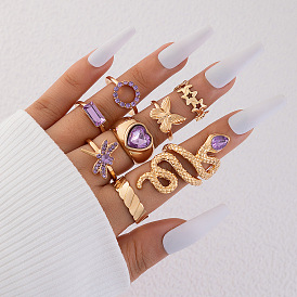 Кольцо с фиолетовой звездой-бабочкой и инкрустацией бриллиантами в виде любовной змеи-стрекозы (8 штук)