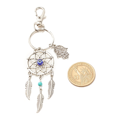 Porte-clés pendentif en alliage de style tibétain, avec des perles turquoises synthétiques et des perles au chalumeau mauvais œil faites à la main et des accessoires en alliage et fer, filet/toile tissé avec plume et main hamsa