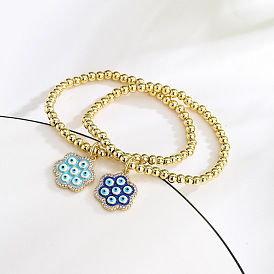 Bracelet de luxe œil bleu avec plaqué or 14 carats et pierres de zircone
