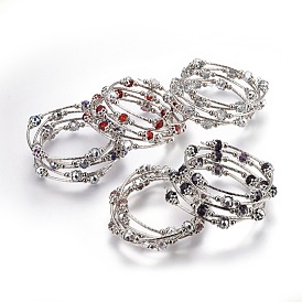 Cinq boucles de bracelets en verre à facettes, avec perles en laiton et perles de fer