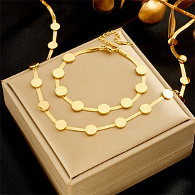 Fashionable Minimalist Gold Titanium Steel Women's Bracelet Necklace Set with Snake Bone Chain and Round Disc Pendant Jewelry.