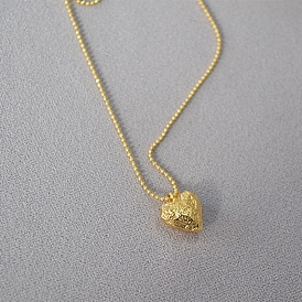 Collier pendentif coeur en laiton avec chaînes boules