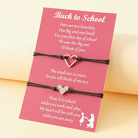 Élégant bracelet cœur en acier inoxydable avec bande tissée pour la rentrée scolaire - parfait pour créer des liens parent-enfant !