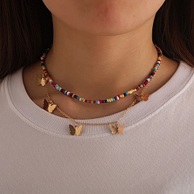 Collier double couche à la mode avec perles de riz colorées et pendentif papillon pour femme