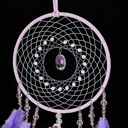 Toile/filet tissé en fil de fer et de laiton avec des décorations de pendentifs en plumes, avec du plastique, améthyste et perles de verre, recouvert d'un cordon en cuir, plat rond et arbre de vie