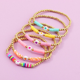 Bracelet en argile colorée de style bohème avec perles coeur et cordon d'amitié