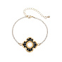 Bracelet à maillons de fleurs en perles de verre avec chaînes en acier inoxydable doré