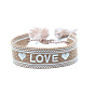Bracelet cordon polyester style ethnique bohème, bracelet réglable mot amour avec breloques pompon