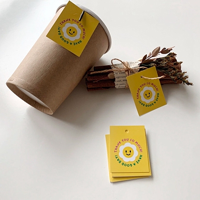 Étiquettes cadeaux rectangulaires en papier avec visage souriant imprimé