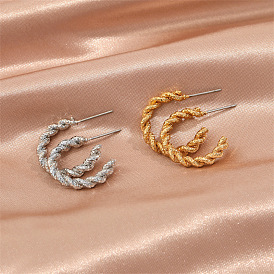Bold Twisted Metal C-shaped Earrings for Women - Punk Rock Statement Ear Studs with Coarse Texture and Distorted Design