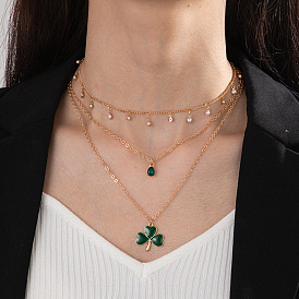 Three-layer necklace with grass pendant - trendy, multi-layered, collarbone chain for women.