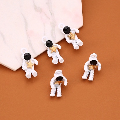 Cuisson pendentifs en alliage peint, l'astronaute plie les jambes autour d'une étoile
