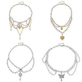 Collier double couche en imitation de perles brillantes avec pompon et croix papillon d'amour - bijoux européens et américains.