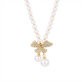 304 Collier pendentif nœud papillon en acier inoxydable avec perles naturelles