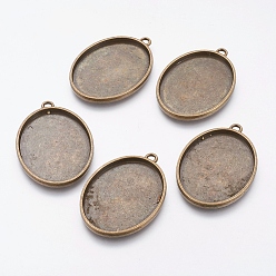 Antique Bronze Tibetan Style Alloy Oval Tray Pendant Cabochon Settings, Plain Edge Bezel Cups, Cadmium Free & Nickel Free & Lead Free, Antique Bronze, Tray: 40x30mm, 48x34x3mm, Hole: 3mm, about 93pcs/1000g