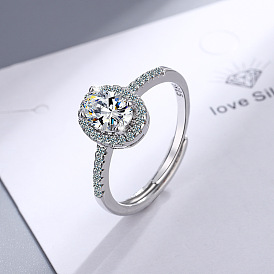 Wide-faced women's ring with round zirconia, factory source - Hand decoration.