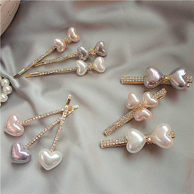 Pince à cheveux élégante en forme de cœur et de perles vintage pour femme