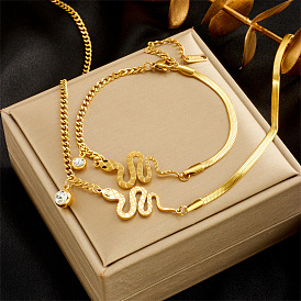 Ensemble de collier et bracelet en acier titane pour femmes, pendentif serpent plaqué or de luxe