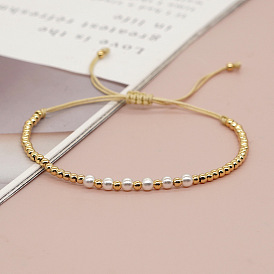 Bracelet minimaliste en perles et perles en or pour femme - bijoux de main de luxe à la mode