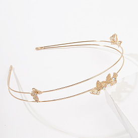 Elegant Butterfly Metal Headband for Stylish Bride - Chic and Sophisticated.