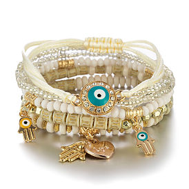 Bracelet multicouche de perles fait à la main, européen et américain, à la mode, tempérament de perles pour les yeux.