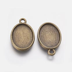 Antique Bronze DIY Pendant Making, with Tibetan Style Alloy Pendant Cabochon Settings and Glass Cabochons, Nickel Free, Oval, Antique Bronze, 24.5x15.5x3mm, Hole: 2mm, Tray: 18x13mm