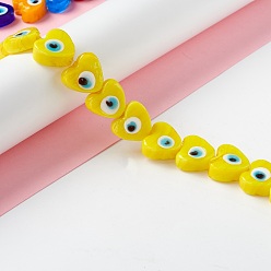 Yellow Handmade Evil Eye Lampwork Beads, Heart, Yellow, 14.5~15x15.5~16x6.5~7.5mm, Hole: 1~1.6mm, about 25pcs/strand, 14.02~13.66 inch(34.7~35.6cm)