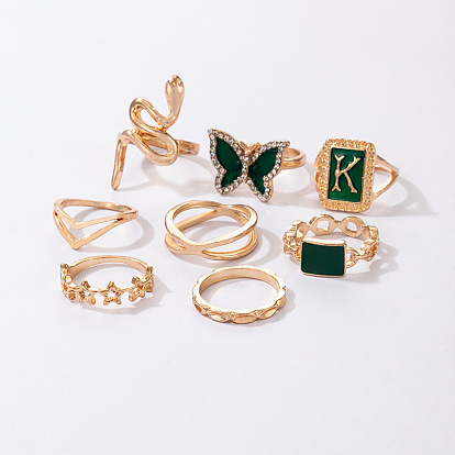 Потрясающий комплект женских колец с пентаграммой в виде змеи и бабочки из золота и зеленого цвета с буквой K