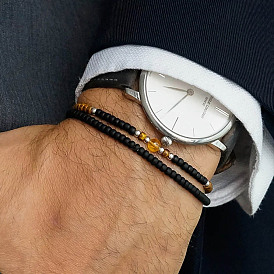 Браслеты из черного стекла, тигрового глаза и синтетических драгоценных камней, круглые