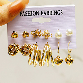 Boucles d'oreilles en perles papillon en métal - ensemble de boucles d'oreilles coeur simples (pièces)