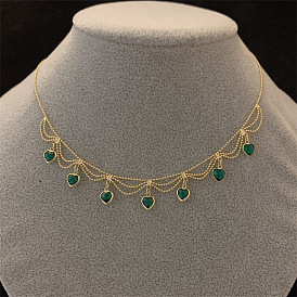 Женское ожерелье-нагрудник с подвеской в виде сердца из латуни, инкрустированной кубическим цирконием., золотые