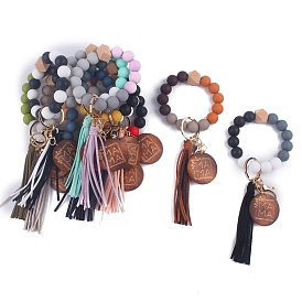 Porte-clés de bracelet en perles de silicone, avec pompon en simili cuir et planche mot mama, pour les femmes clé de voiture ou décoration de sac