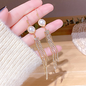 Elegant Pearl Tassel Earrings - Chic, Fashionable, Long Dangling Ear Drops.