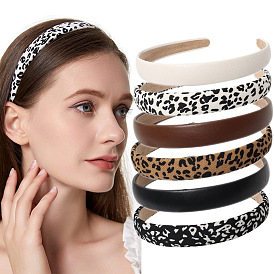 Retro French Leopard Cow Headband for Women, Chic and Elegant Hair Accessory with Anti-Slip Leather Strap, Perfect for Any Occasion.