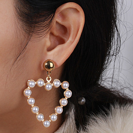 Fashionable Heart-shaped Pearl Earrings - Simple and Personalized, European and American Style.