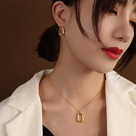 Geometric Necklace and Earrings Set in Titanium Steel with 18K Gold Accents by Marka
