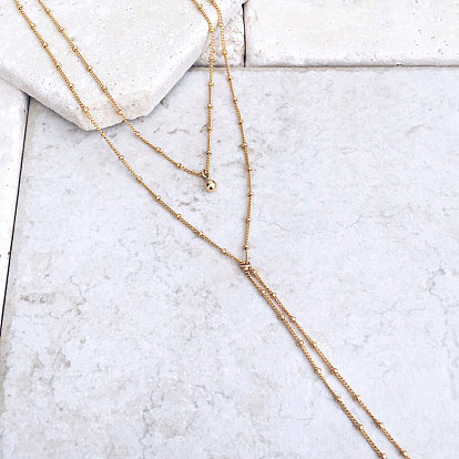 Collier double couche en Y à la mode-chaîne de pull à pampilles en perles simple et élégante pour femmes.