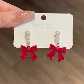 Серьги-гвоздики с подвесками из сплава с бантом и флокированием, с имитацией жемчуга, золотые