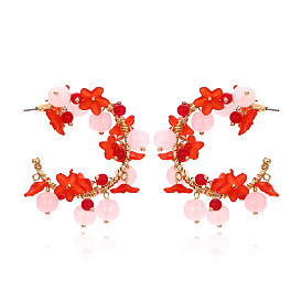 Handmade woven flower earrings with crystal beads - versatile and stylish.