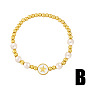 Minimalist Pearl Bracelet with Cross, Stars and Moon Charms - Elastic Stretch Handmade Jewelry