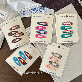 Заколки-клеш с леопардовым принтом и эмалированными кнопками