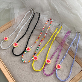 Fashionable Minimalist Soft Ceramic Rice Bead Necklace - Versatile Heart Lock Clavicle Chain for Women.