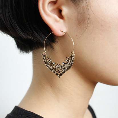 Retro Hollow Alloy Pendant Earrings and Studs - Fashionable and Creative