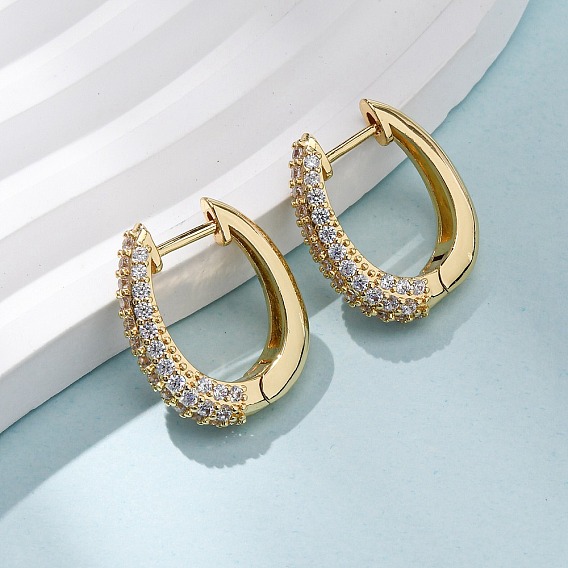 Овальные серьги-кольца из латуни с микропаве из прозрачных кубических цирконий